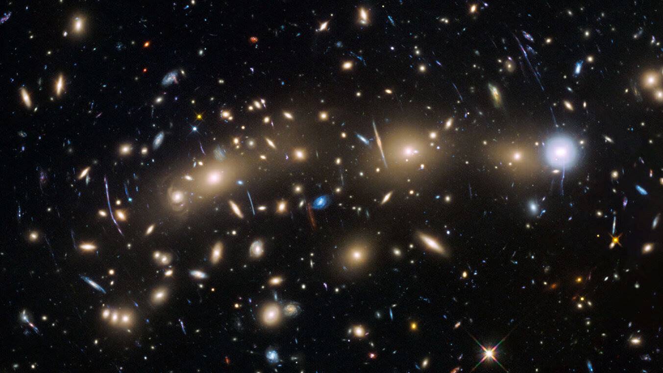 The galaxy cluster MACS J0416.1-2403 lies about 4 billion light years from Earth. Credit: NASA, ESA and the HST Frontier Fields team (STScI)